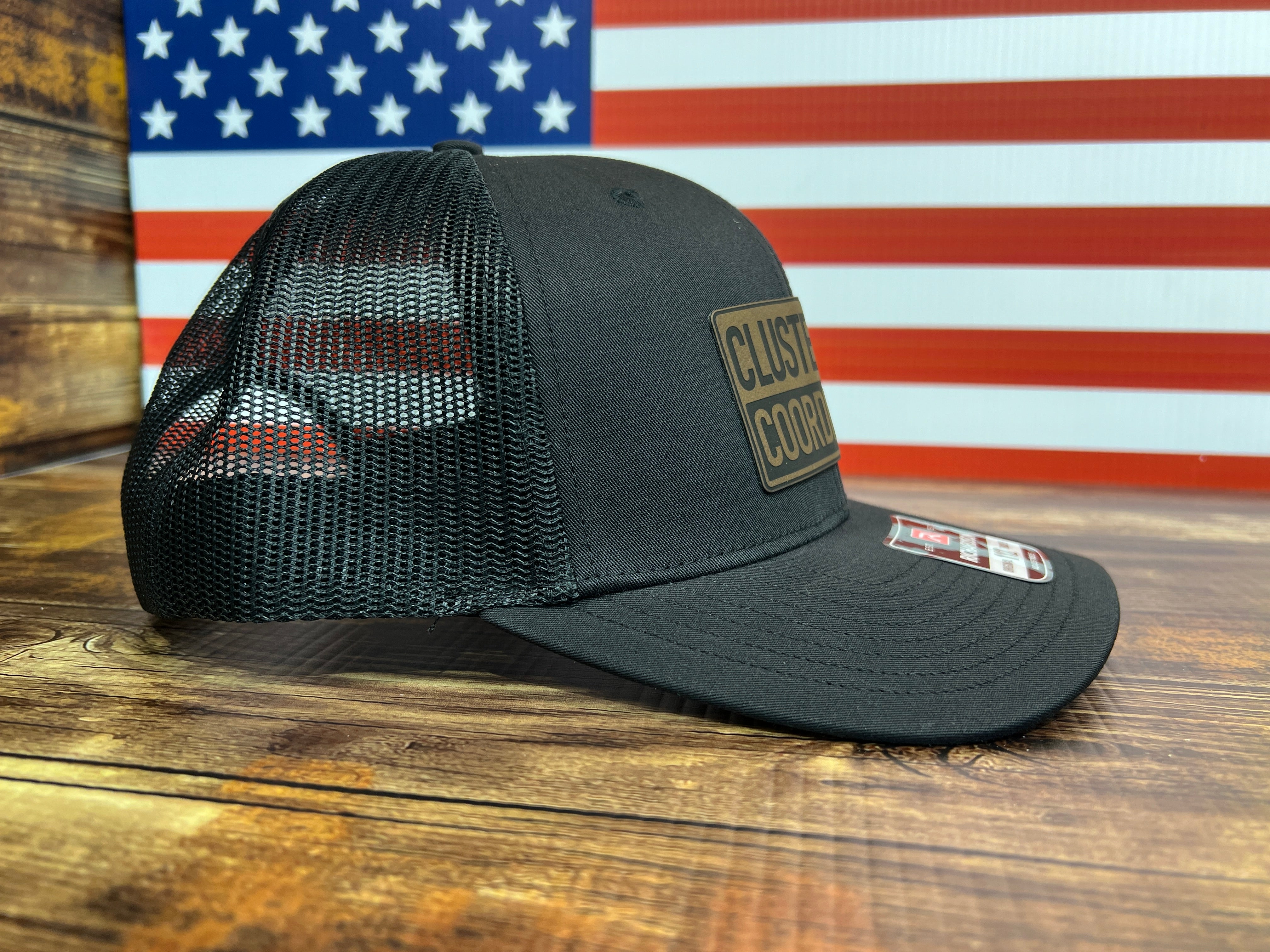 Clusterfu*k Coordinator Trucker Hat with Premium Leatherette Patch on a Richardson 112 Hat