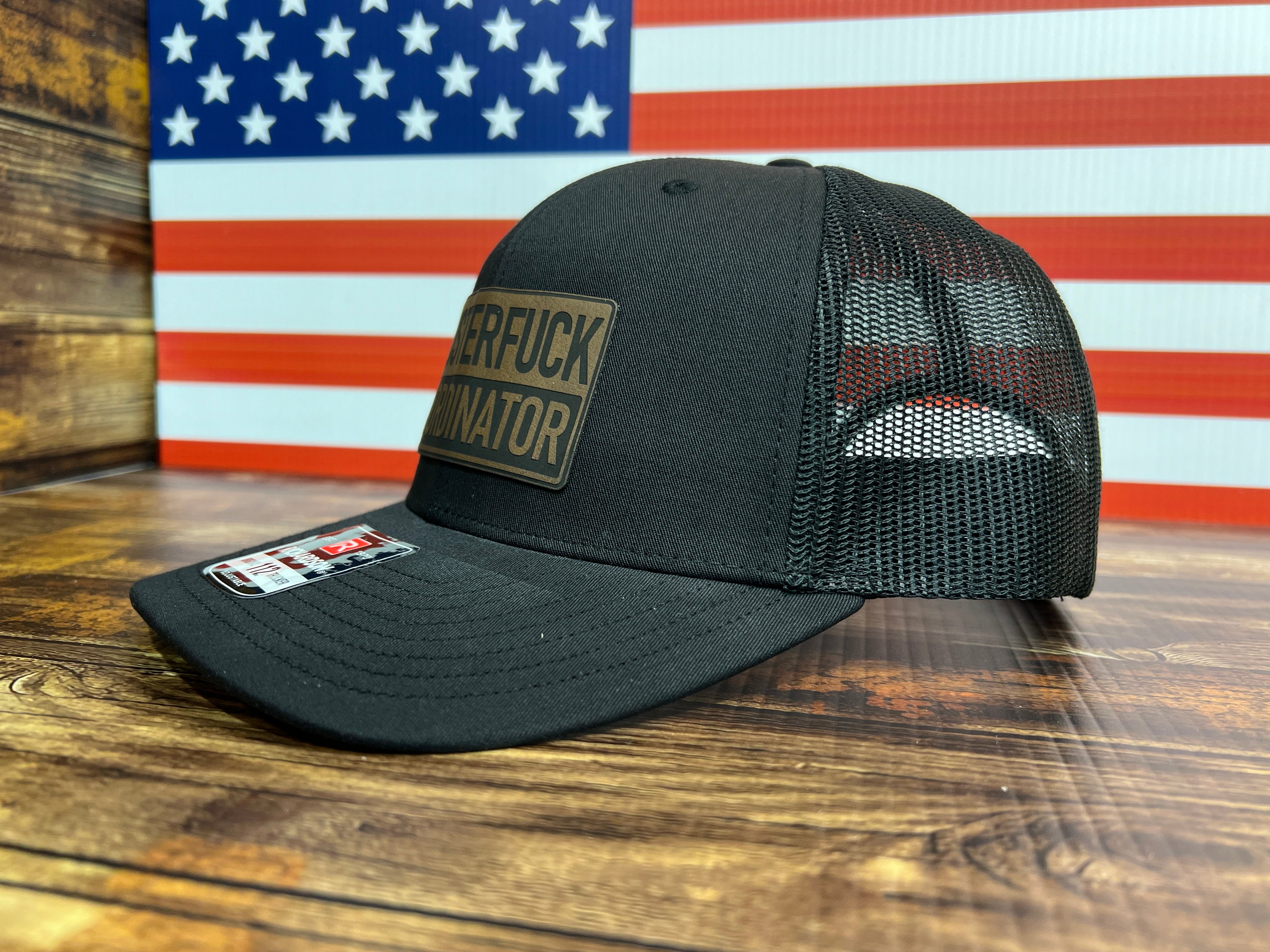 Clusterfu*k Coordinator Trucker Hat with Premium Leatherette Patch on a Richardson 112 Hat