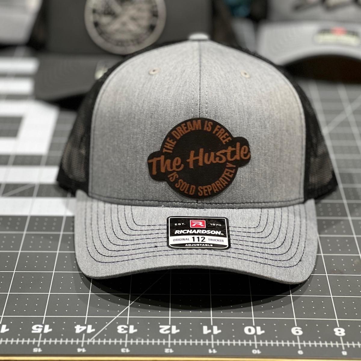 Hustle Patch Hat with leatherette patch on Richardson 112 Trucker Hat