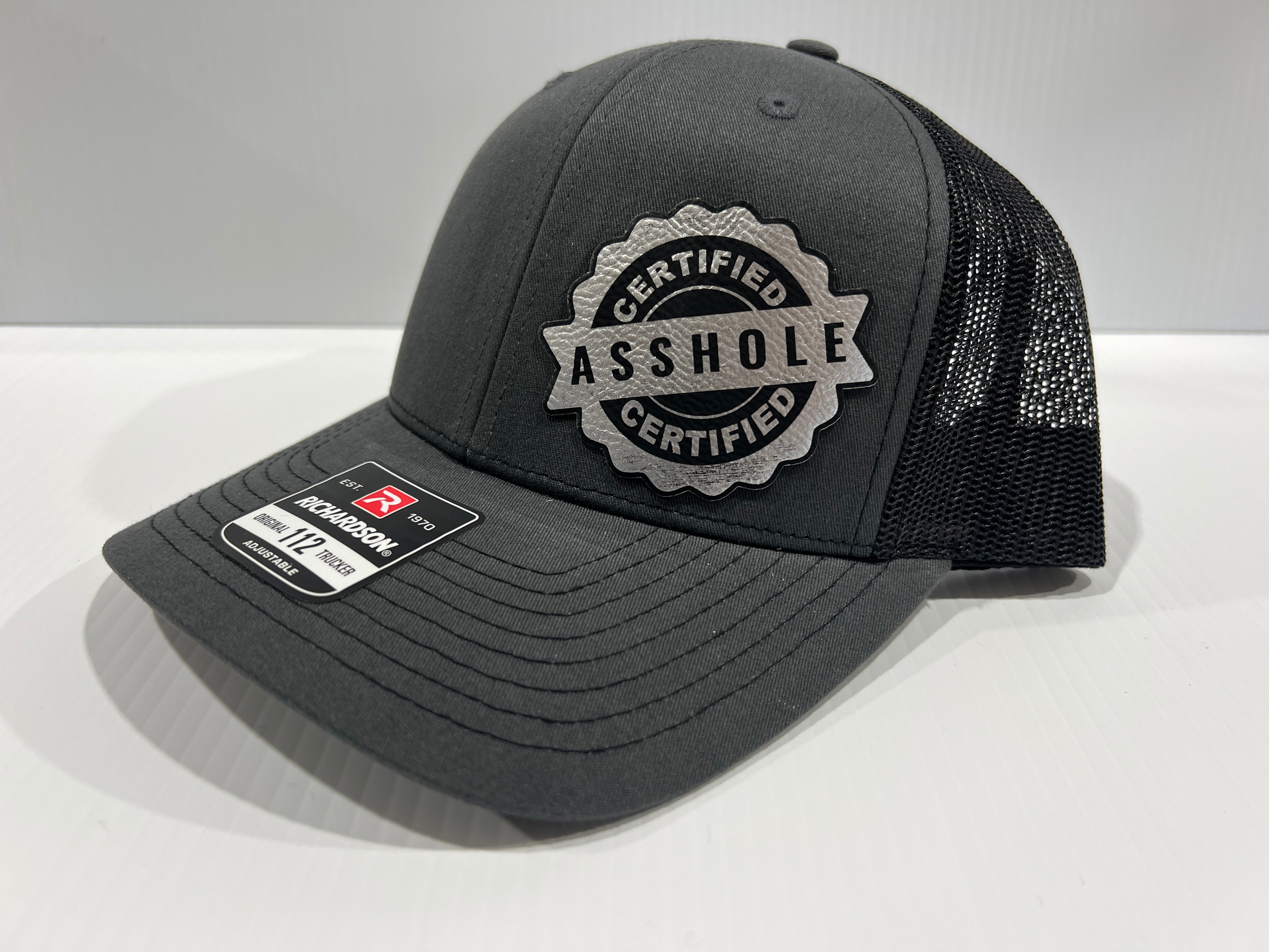 Certified A-Hole Hat with Engraved Leatherette Patch on Richardson 112 Trucker Hat