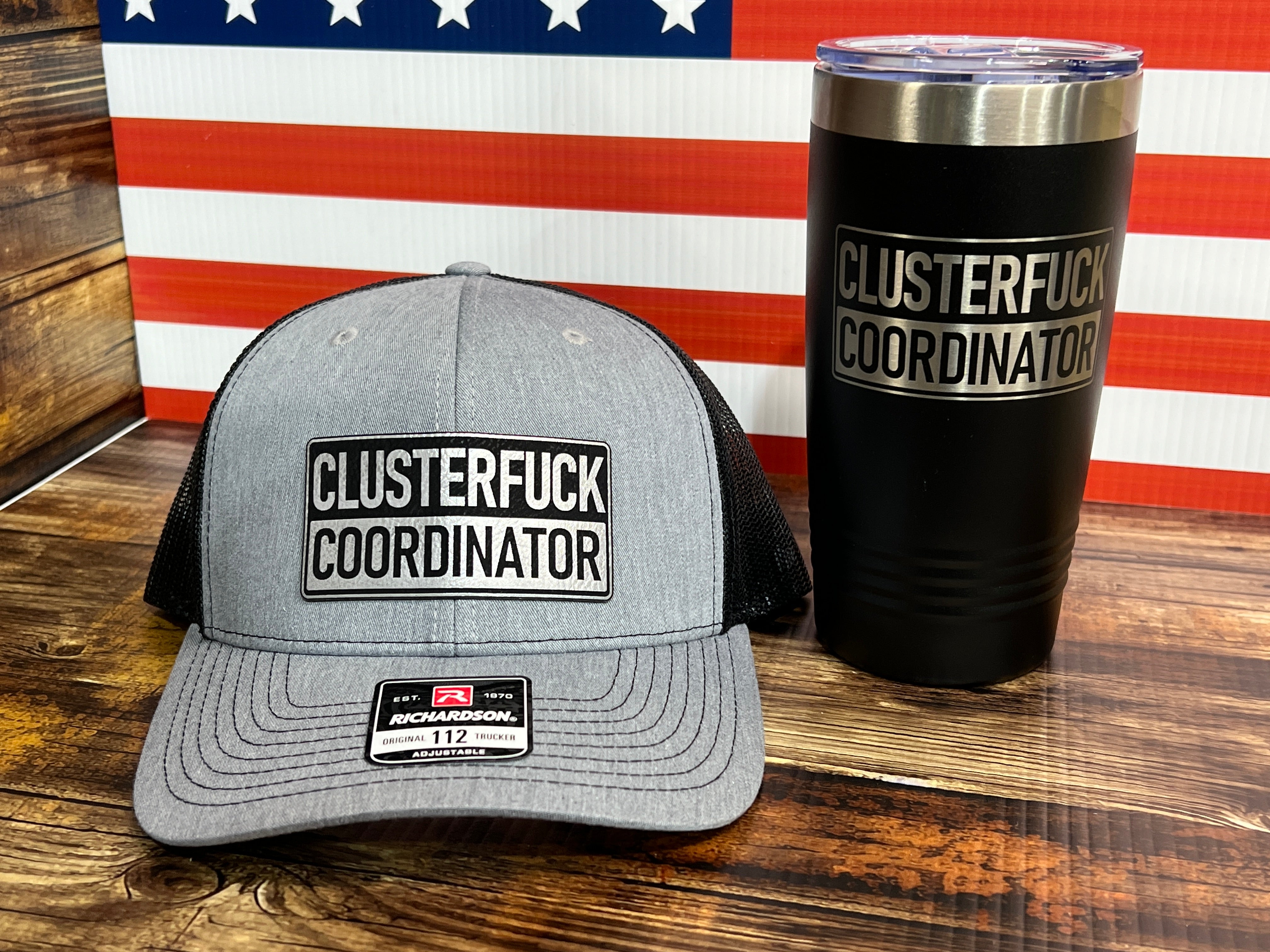 Clusterf*ck Coordinator Hat & Tumbler Combo Premium Leatherette Engraved Patch on a Richardson 112 Trucker Hat & 20 oz Polar Camel Tumbler