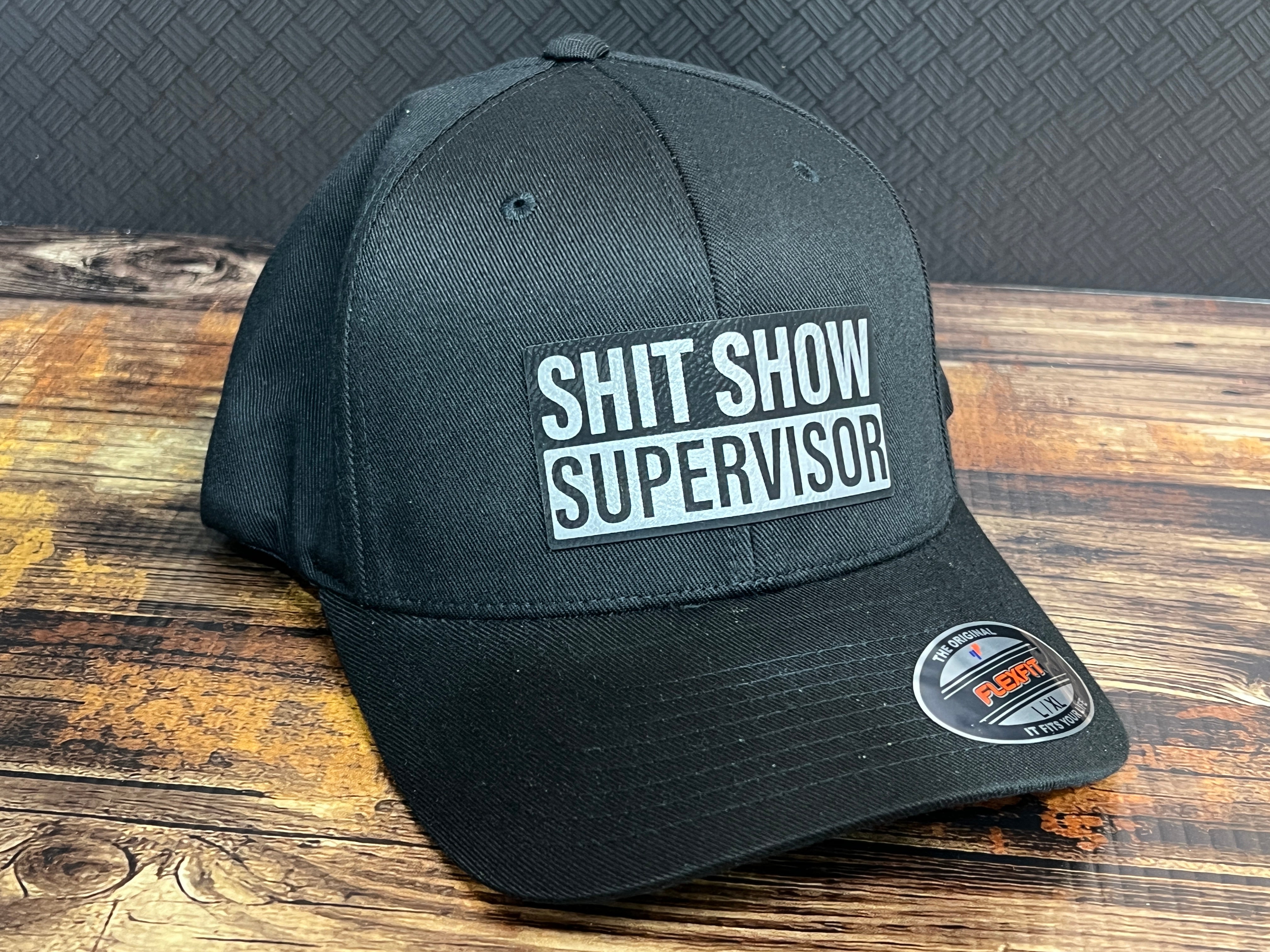 Shit Show Supervisor Hat with Premium Leatherette Patch on a Flexfit Patch Hat