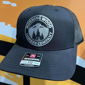 Morning Wood Hat with engraved Premium Leatherette Patch on a Richardson 112 Trucker Hat with adjustable snapback.